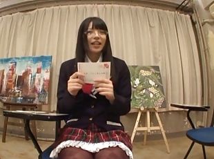 Japanese hussy wearing glasses and a miniskirt plays with her snatch
