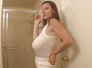 GILF with saggy boobs in a T-shirt