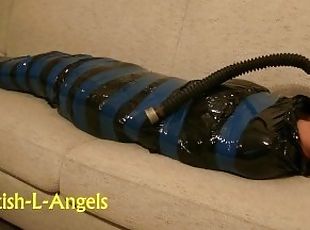 (SAFE AND VOLUNTARY), Mummification slave girl relaxing in her free time before service