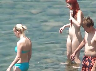 Hot nudists are posing on the beach