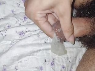 Took the Creampied condom  off my big cock very lubed