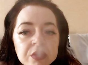 Mistress Lara is vaping in sexy lingerie at home