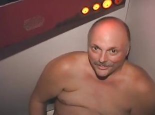 Bald Chubby Daddy Bear Blowing Penis in Dirty Glory Hole Gayness Jacks Off on Floor Swallowing COCKS