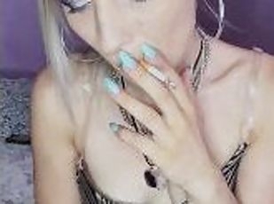 young sexy italian girl smokes a cigarette